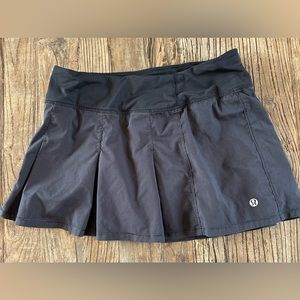 LULU LEMON PLEATED BLACK SKORT. tennis/running/errands. Back zip pocket. Size 4